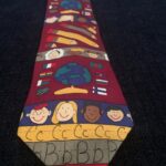 Education-themed tie from the collection