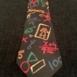 Education-themed tie from the collection