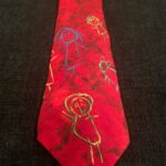 Education-themed tie from the collection