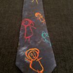 Education-themed tie from the collection